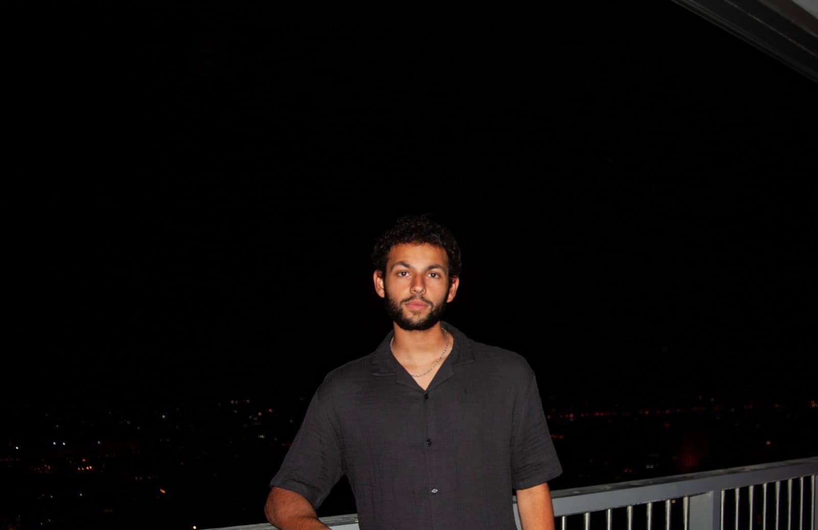 Portrait, night balcony